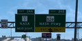 The former signage showcasing NASA Road 1, NASA, and NASA Parkway prior to the post-release change